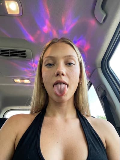 NSFW AI Image Generator: Naughty Ai Girlfriend Blonde Tongue Out Car Selfie